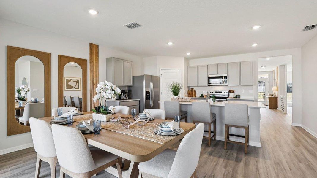 Furnished interior in a model home at Sun N Lake in Sebring (Image 8).