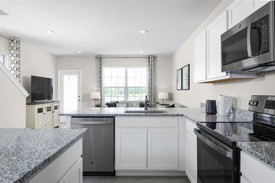 LOW-MAINTENANCE LIVING NEAR I-295 WITH SPACIOUS PATIOS AND MODERN KITCHEN FEATURES