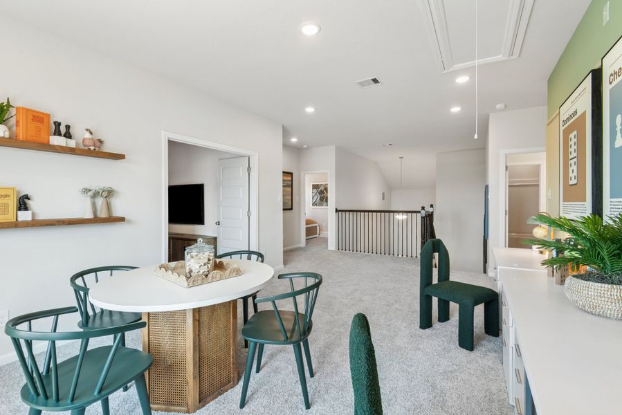 The Princeton II- Loft/Game Room into the Media Room and Secondary Bedrooms and Baths