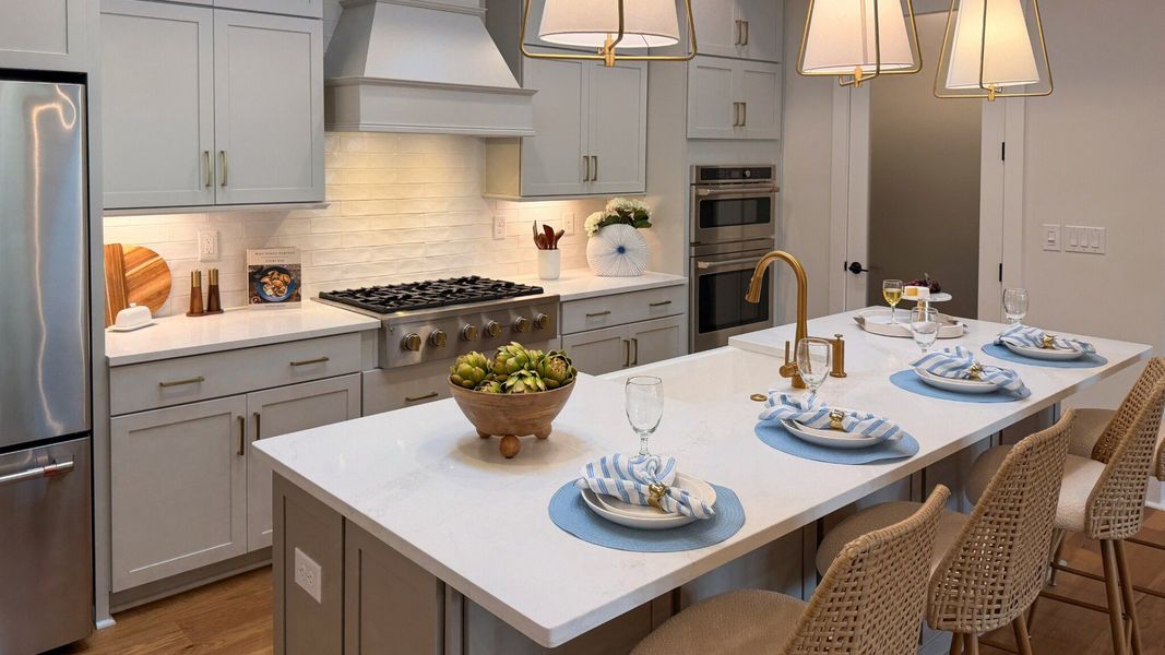 Furnished interior in a model home at The Courtyards at Walters Farm in Huntersville (Image 27).