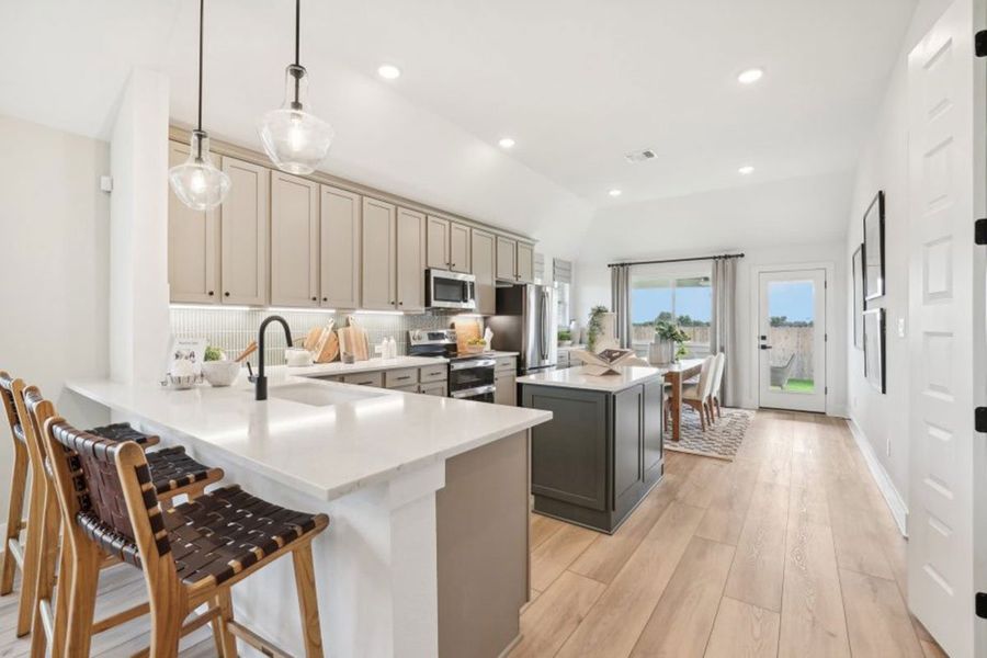 Furnished interior in a model home at Grande Estates in Bertram (Image 22).
