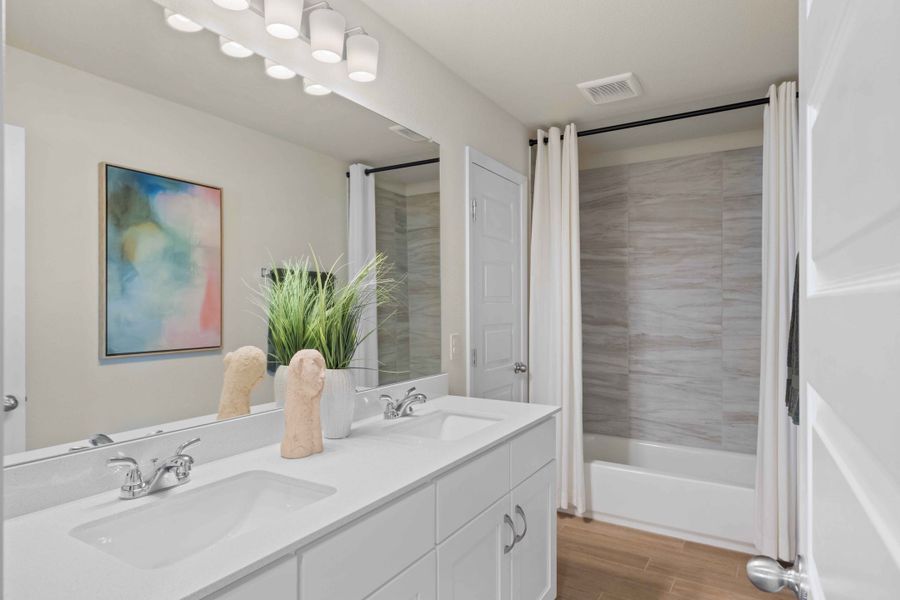 Furnished interior in a model home at Edgebrooke in Pflugerville (Image 28).