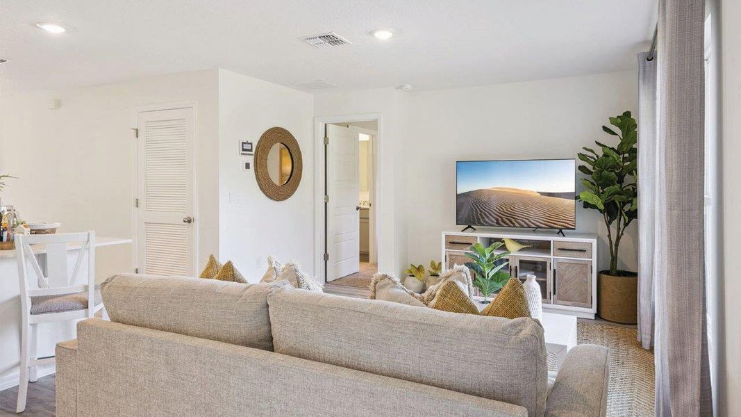 Furnished interior in a model home at Magnolia Pointe in Umatilla (Image 8). Furnished interior in a model home at Magnolia Pointe in Umatilla (Image 8).