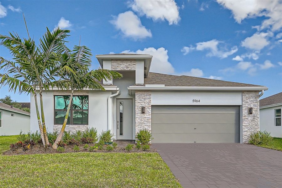 Front exterior of a home in the Willow Pointe community, located in Stuart, FL (Image 6).