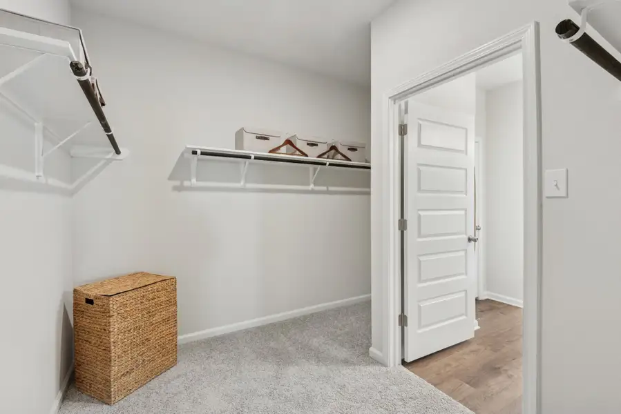 The Princeton II- Primary Suite Walk-in Closet The Princeton II- Primary Suite Walk-in Closet