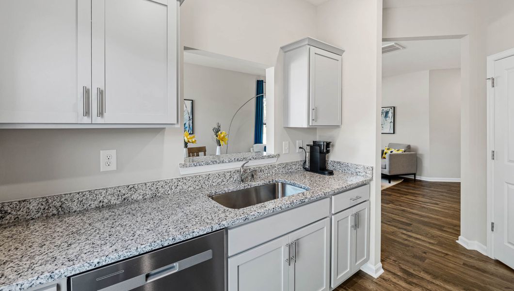 Furnished interior in a model home at Covington Village in Greer (Image 11).