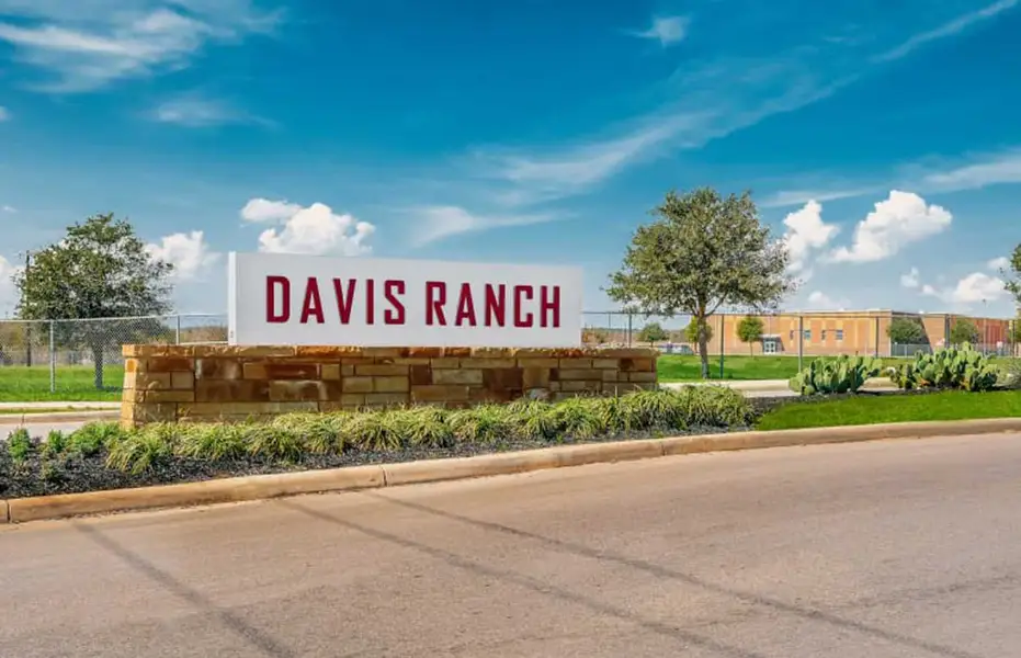Entrance to the Davis Ranch: 50ft. lots community in San Antonio, TX, featuring signage and landscaping (Image 1).