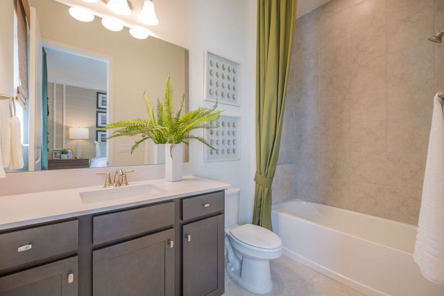 Furnished interior in a model home at Legends Preserve in Daytona Beach (Image 12).