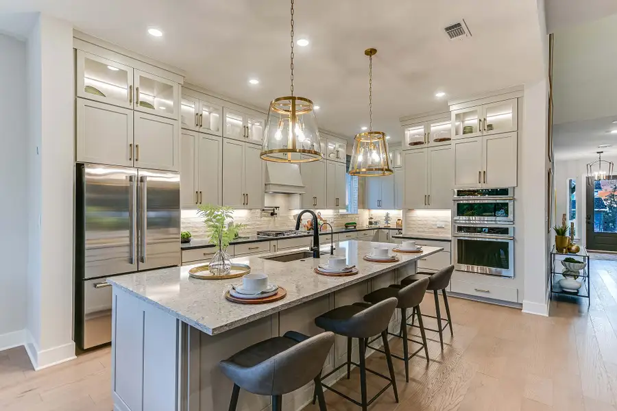 Furnished interior in a model home at Wolf Ranch – West Bend in Georgetown (Image 6).