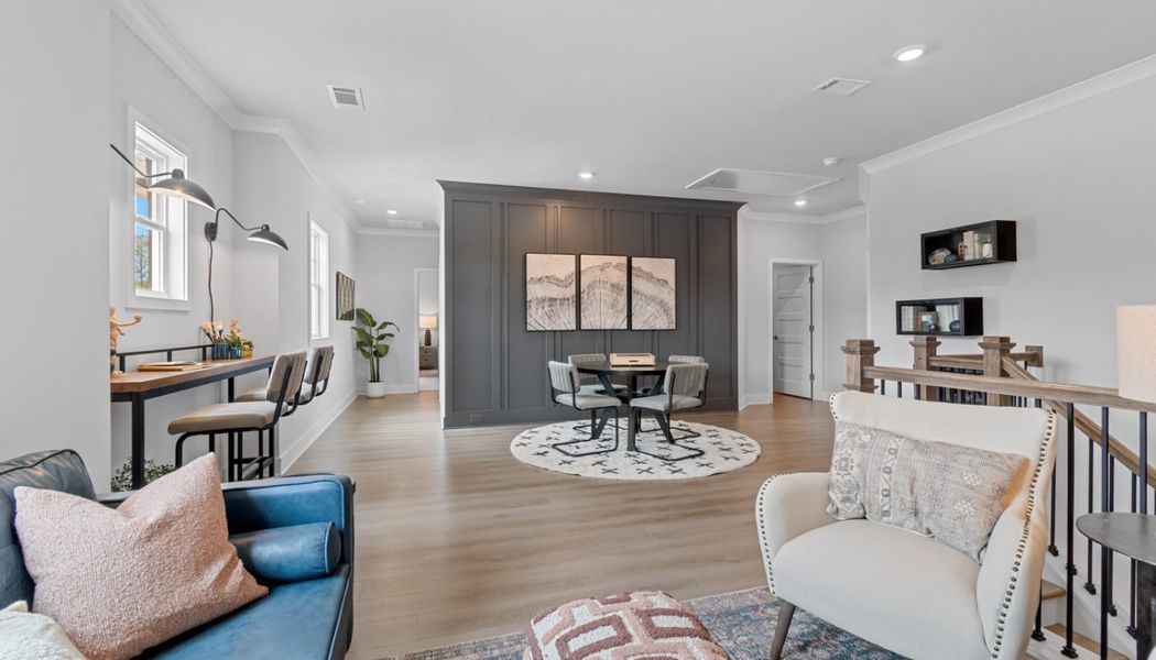 Furnished interior in a model home at Summerlin in Winder (Image 42).