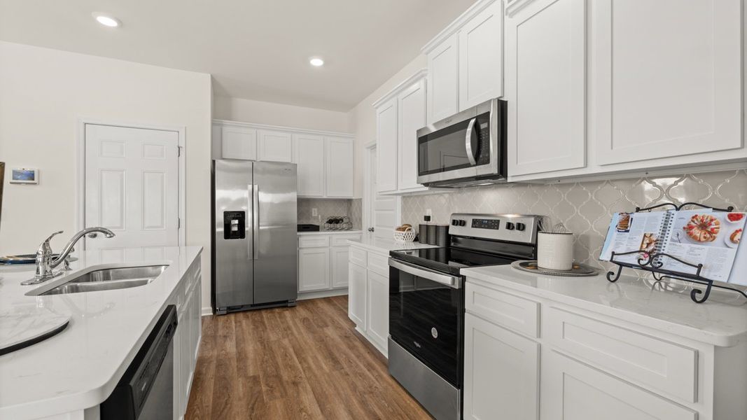 Furnished interior in a model home at Shoal Creek in Hampton (Image 7).