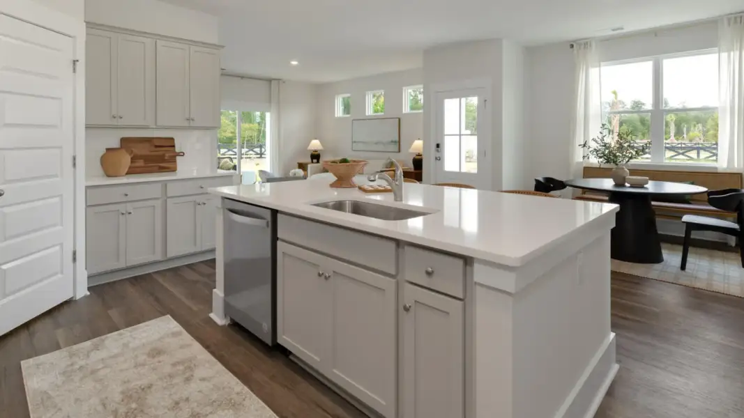 Furnished interior in a model home at The Retreat at Indigo Preserve Townhomes in Leland (Image 10).
