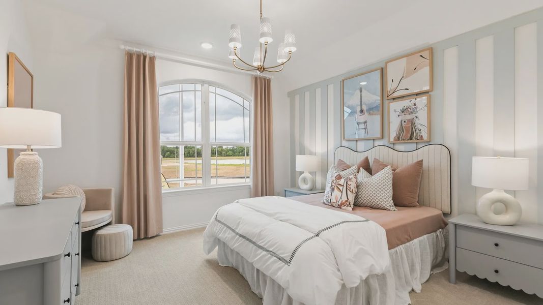 Luxurious bedroom featuring a classic arched window, bespoke striped wall, and chic chandelier in Katy Lakes. Luxurious bedroom featuring a classic arched window, bespoke striped wall, and chic chandelier in Katy Lakes.