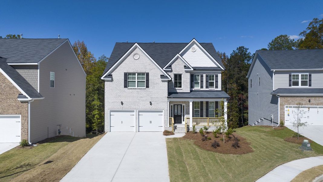 Front exterior of a home in the Water Oak Estates community, located in Lawrenceville, GA (Image 18).