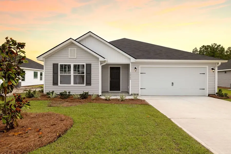 Front exterior of a home in the Woodland Cove community, located in Brunswick, GA (Image 6).