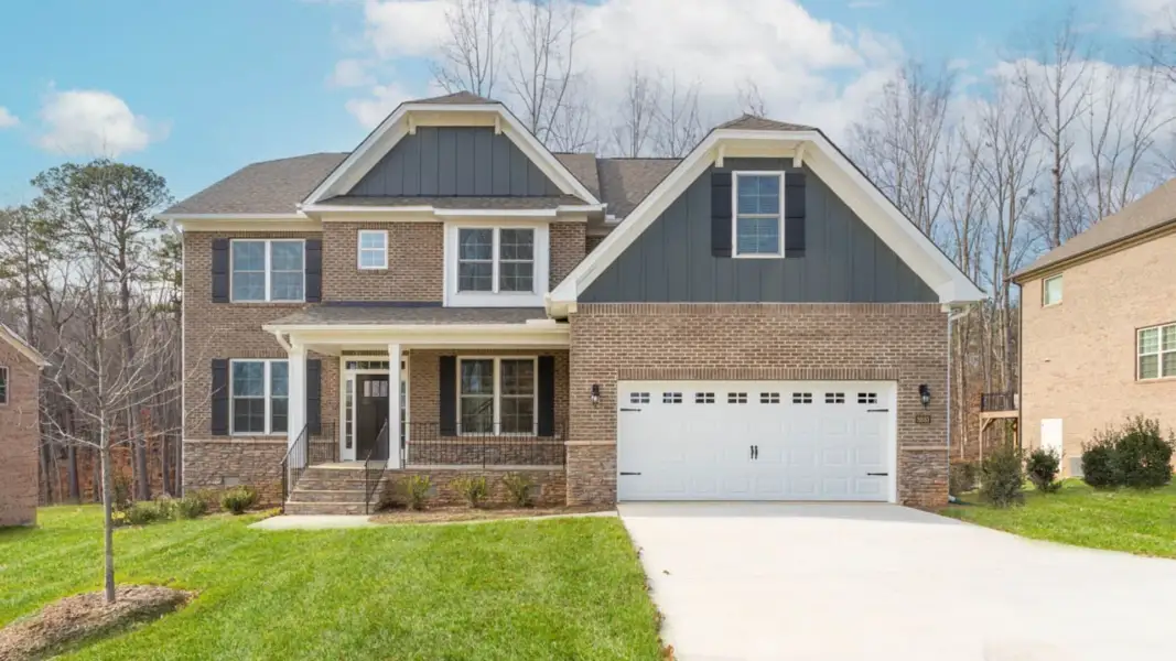 Front exterior of a home in the Conrad Farm community, located in Pfafftown, NC (Image 1). Front exterior of a home in the Conrad Farm community, located in Pfafftown, NC (Image 1).
