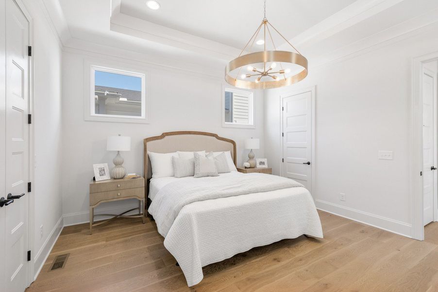 Furnished interior in a model home at SouthVale in Franklin (Image 9).