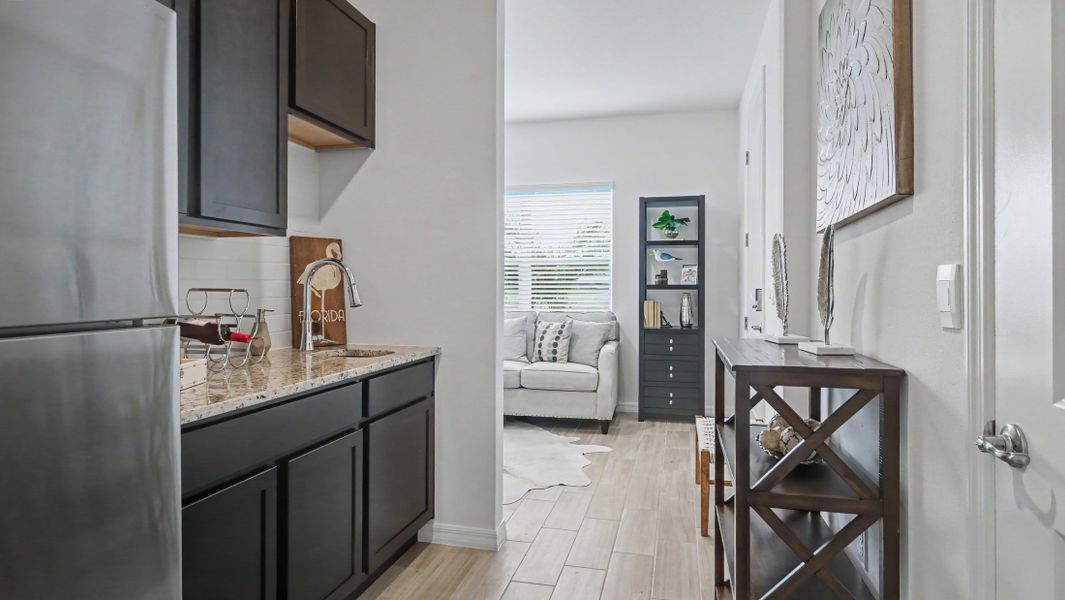 Furnished interior in a model home at Oakwood Estates in Green Cove Springs (Image 9).
