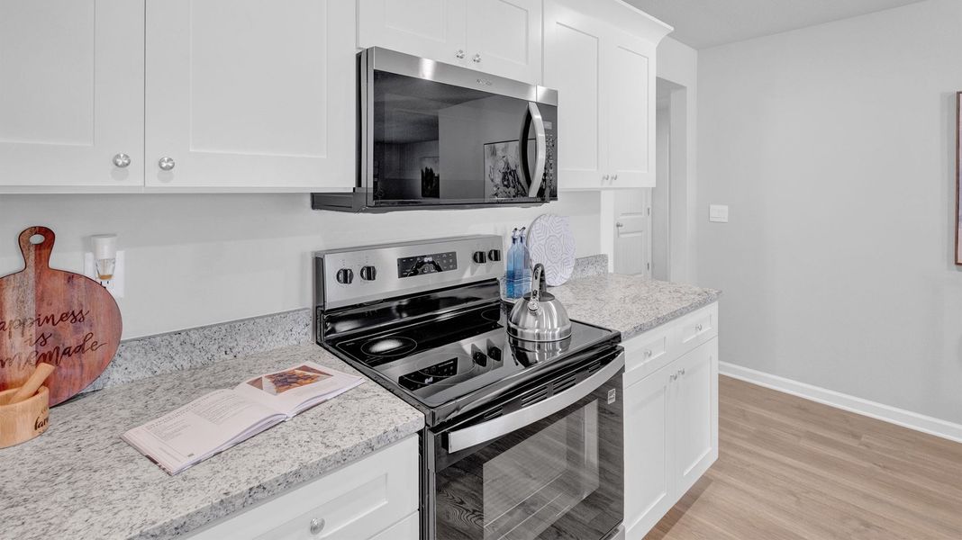 Furnished interior in a model home at Riggs Pointe in Millington (Image 16).