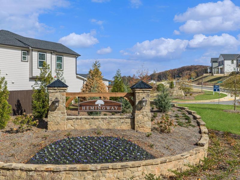 Entrance to the Hemingway community in Cumming, GA, featuring signage and landscaping (Image 1). Entrance to the Hemingway community in Cumming, GA, featuring signage and landscaping (Image 1).