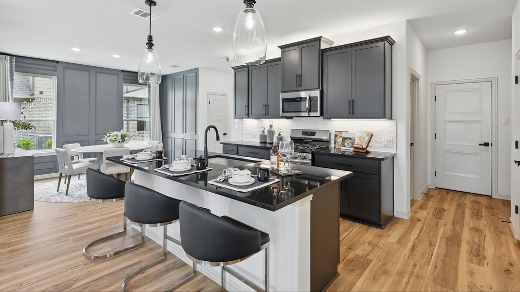 Furnished interior in a model home at Westridge Journey in McKinney (Image 9).