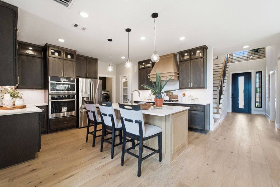 Furnished interior in a model home at Grand Magnolia in Waller (Image 26).