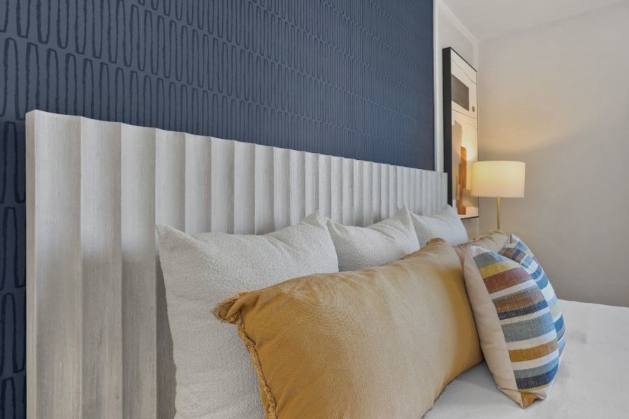 A bed with pillows.
