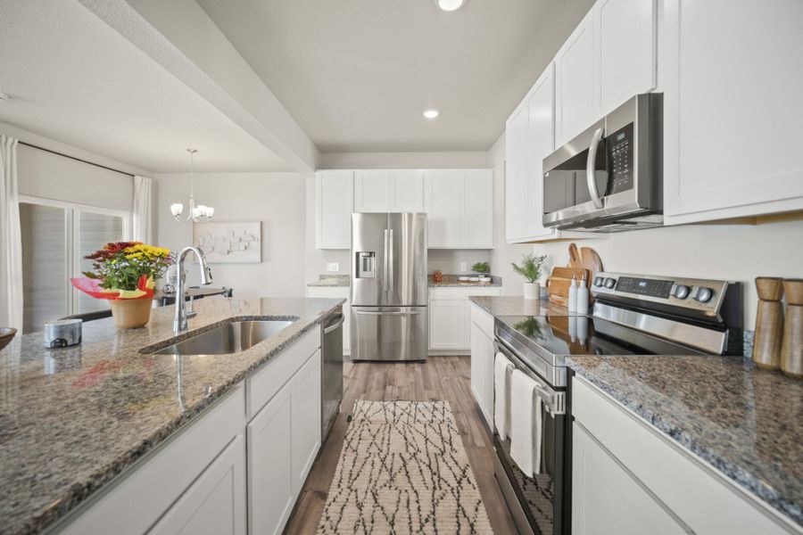 Furnished interior in a model home at Aspen Meadows – Townhomes in Colorado Springs (Image 5). Furnished interior in a model home at Aspen Meadows – Townhomes in Colorado Springs (Image 5).
