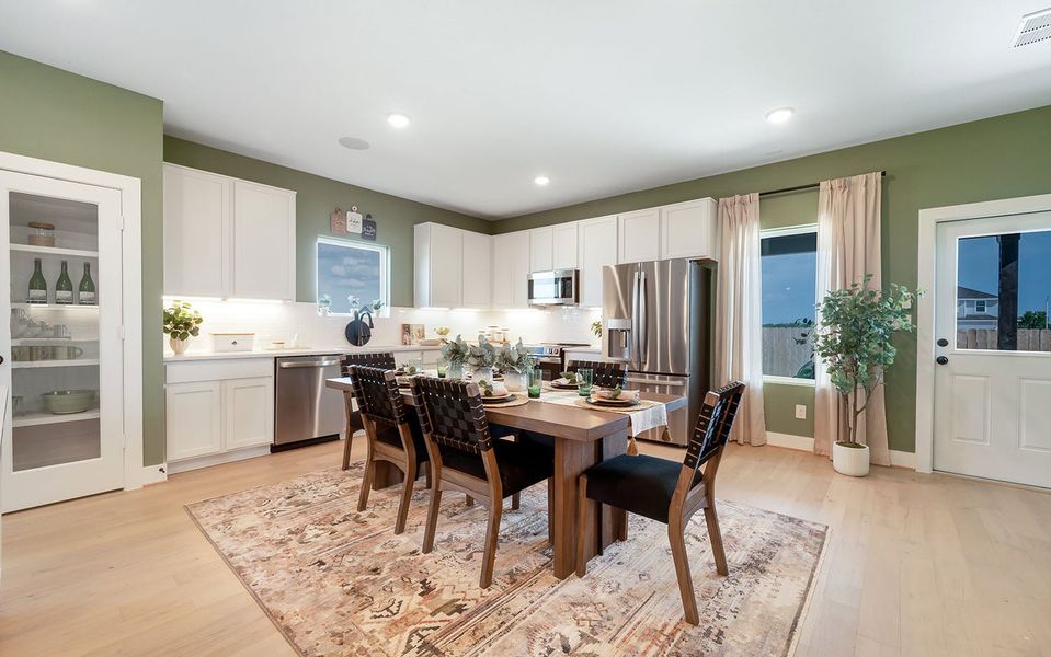 Furnished interior in a model home at Grande Estates in Bertram (Image 22).