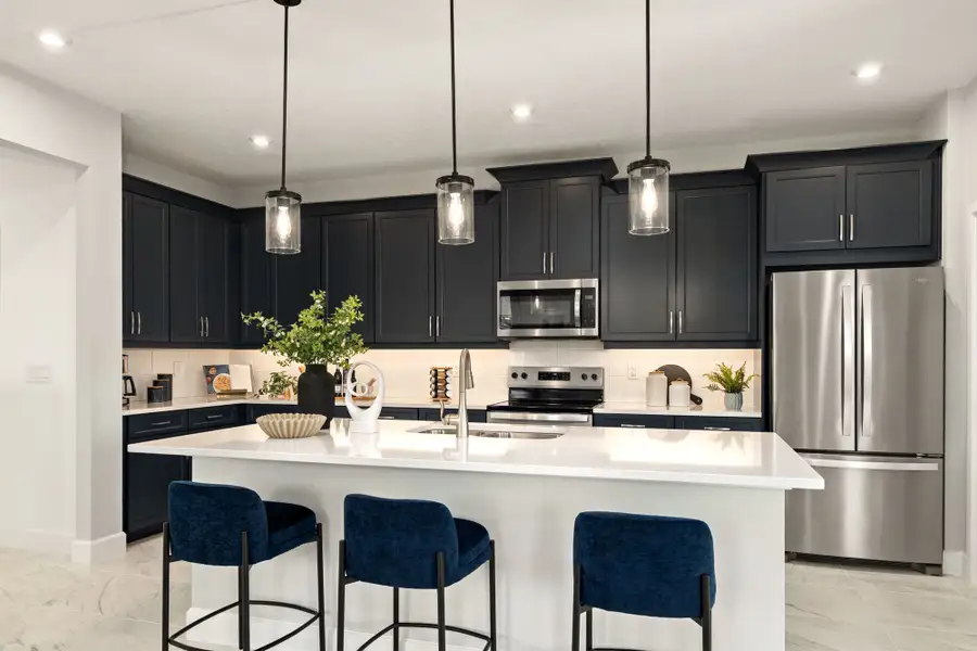 Furnished interior in a model home at Rainwood in Groveland (Image 5).