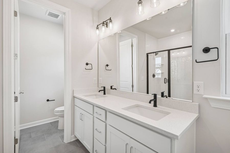 Furnished interior in a model home at Carriages at Chatham Park in Pittsboro (Image 42). Furnished interior in a model home at Carriages at Chatham Park in Pittsboro (Image 42).