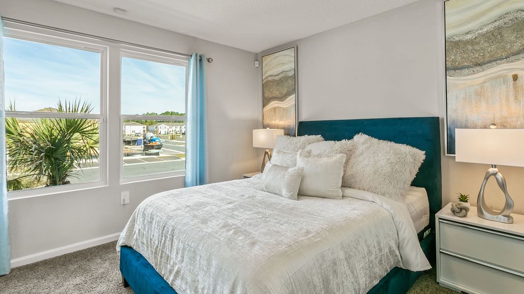 Furnished interior in a model home at Stokes Landing Express in St. Augustine (Image 18).