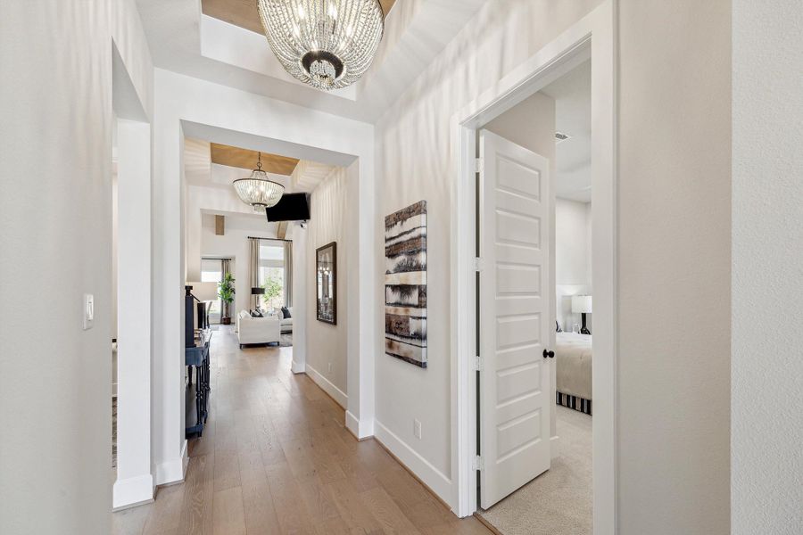 Furnished interior in a model home at The Woodlands Hills – 65' in Willis (Image 2). Furnished interior in a model home at The Woodlands Hills – 65' in Willis (Image 2).