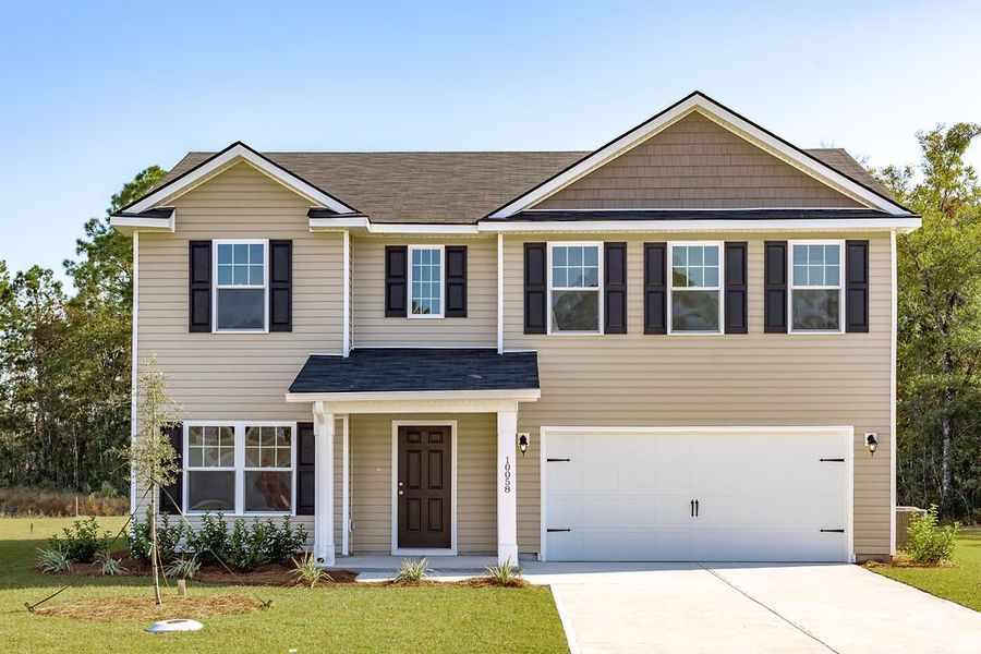 Front exterior of a home in the Woodland Cove community, located in Brunswick, GA (Image 8).