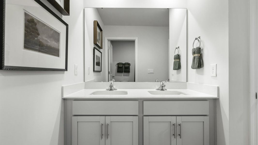 Furnished interior in a model home at Greystone North in Stoneville (Image 17). Furnished interior in a model home at Greystone North in Stoneville (Image 17).