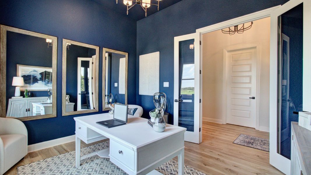 Furnished interior in a model home at The Crossvine in Schertz (Image 9).