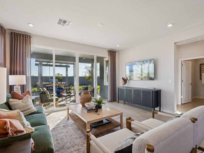 A living room with a fireplace. A living room with a fireplace.