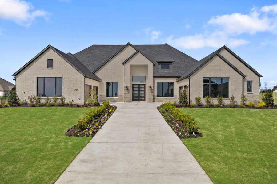 Front exterior of a home in the Las Brisas at Stoney Creek community, located in Sunnyvale, TX (Image 2).
