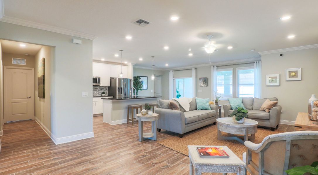 Furnished interior in a model home at Gulf Coast Communities in Port Charlotte (Image 5). Furnished interior in a model home at Gulf Coast Communities in Port Charlotte (Image 5).