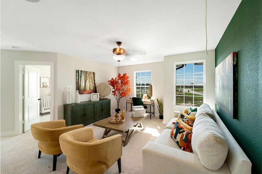 Furnished interior in a model home at Heartland in Crandall (Image 6).