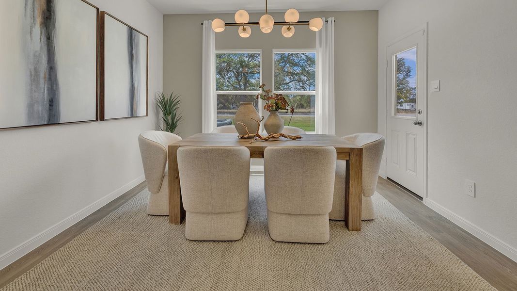 Furnished interior in a model home at Paramount in Kyle (Image 7).