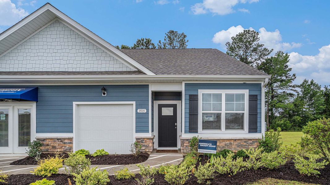 Front exterior of a home in the Rich Square at Brunswick Plantation community, located in Ash, NC (Image 20). Front exterior of a home in the Rich Square at Brunswick Plantation community, located in Ash, NC (Image 20).