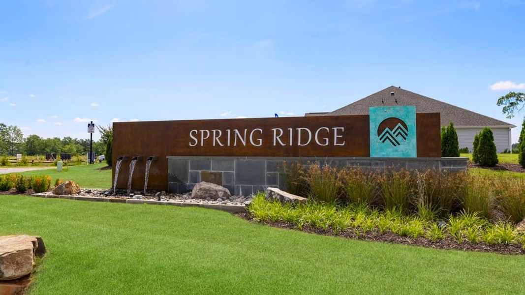 Entrance to the Spring Ridge community in Anderson, SC, featuring signage and landscaping (Image 12). Entrance to the Spring Ridge community in Anderson, SC, featuring signage and landscaping (Image 12).