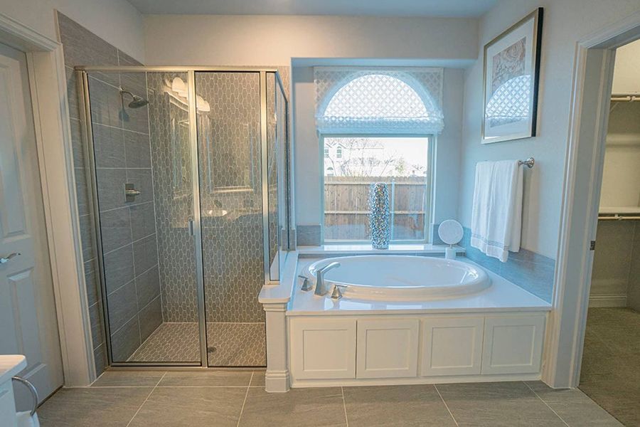 Furnished interior in a model home at Woodcreek in Fate (Image 19).