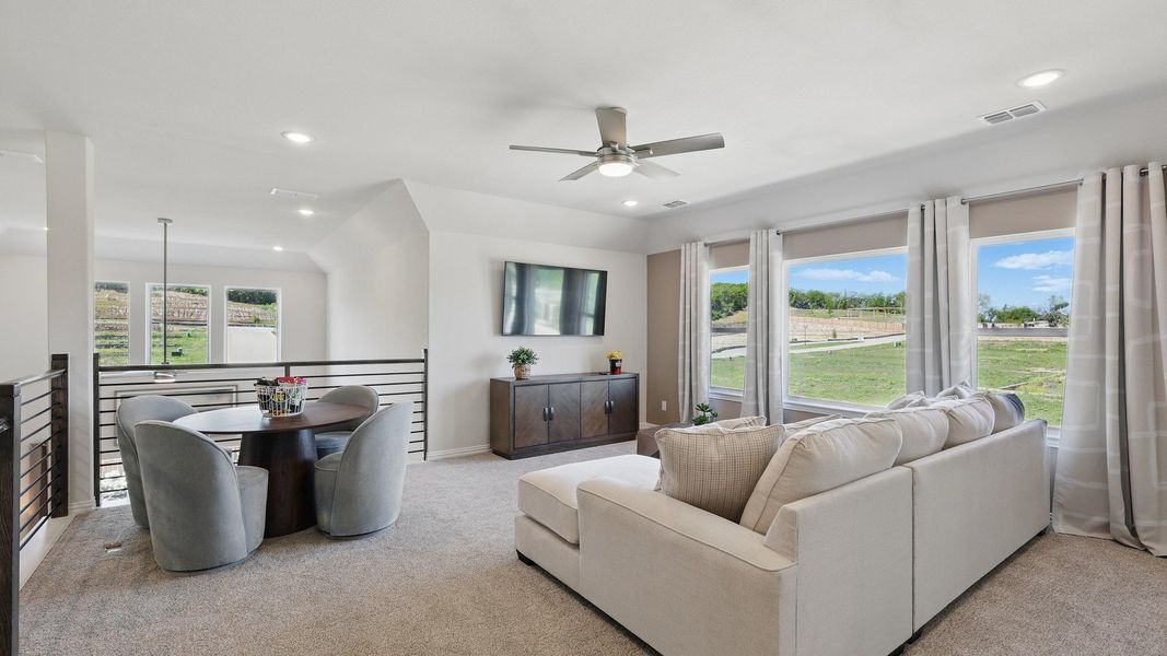 Sophisticated seating area with expansive windows, plush carpeting in Green Oaks Preserve community. Sophisticated seating area with expansive windows, plush carpeting in Green Oaks Preserve community.