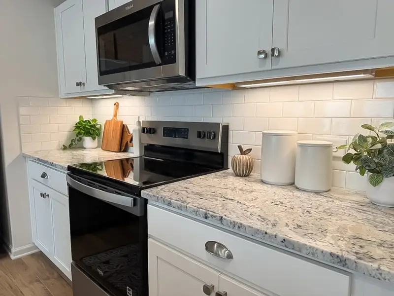 Furnished interior in a model home at Village Green in Adairsville (Image 5).