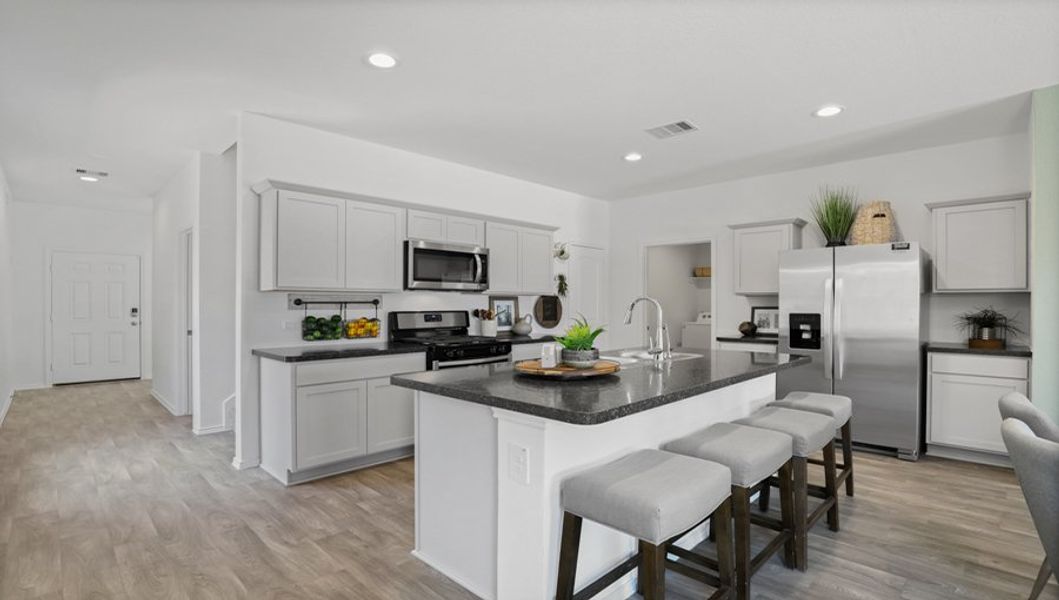 Furnished interior in a model home at Breckenridge Forest in Spring (Image 27).