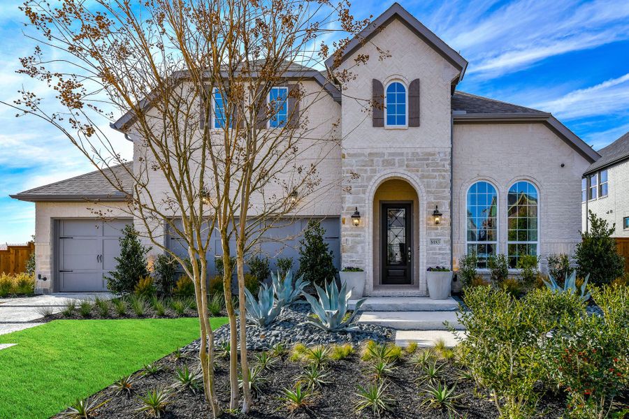 Front exterior of a home in the The Grove Frisco - 55s community, located in Frisco, TX (Image 2). Front exterior of a home in the The Grove Frisco - 55s community, located in Frisco, TX (Image 2).
