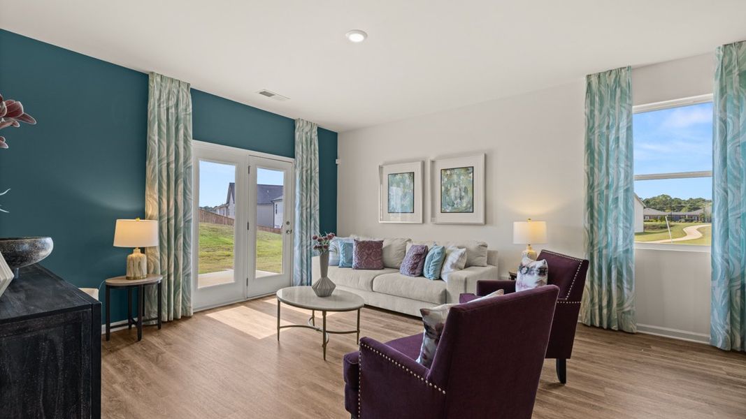 Furnished interior in a model home at Shoal Creek in Hampton (Image 22).