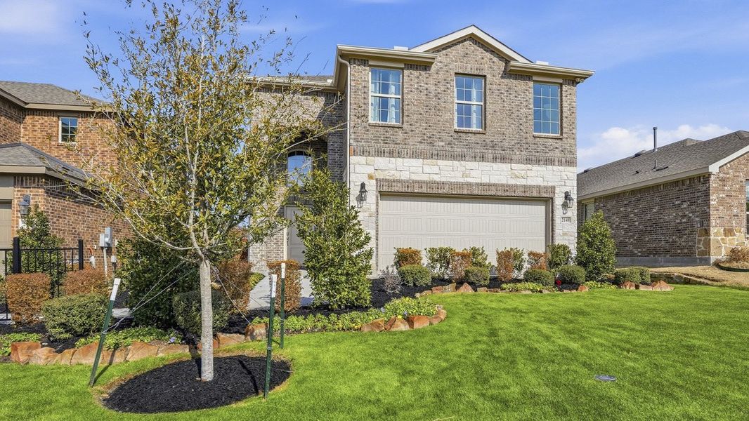 Front exterior of a home in the The Woods at Lindsey Place community, located in Anna, TX (Image 5).